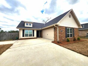 Building Photo - 6061 Twenty One Oaks Dr