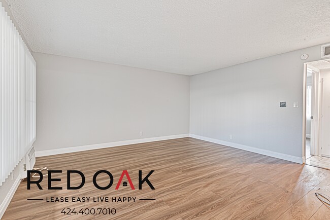 Building Photo - Cheerful One Bedroom with Beautiful Floors...