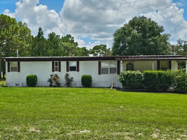 Building Photo - 7096 W Jackson Ln