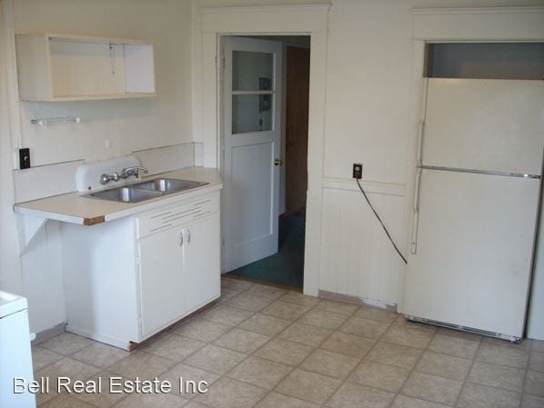 Building Photo - 3 br, 1 bath House - 1011 W. 11th