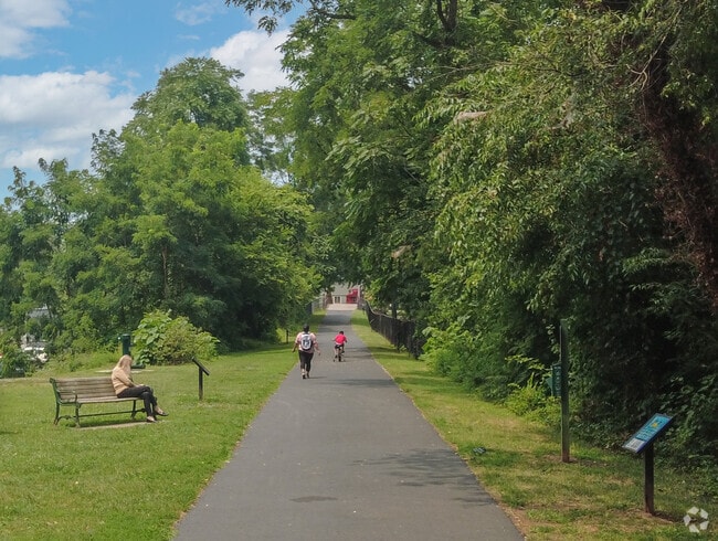 Enjoy a nice walk or relax on a bench at Warrenton Branch Greenway in Warrenton neighborhood.