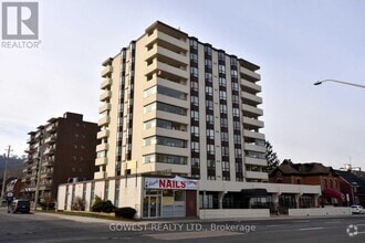 Building Photo - 432-1432 Main St E