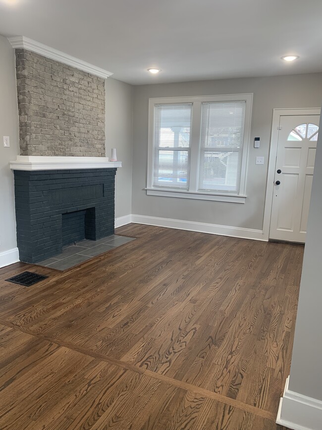 Living room with real wood floors - 421 Zimpfer St