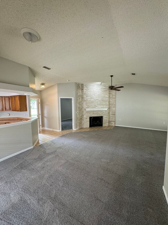 Building Photo - NICE 3 BEDROOM FEATURING WOOD VINYL PLANK ...
