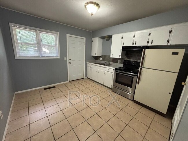 Foto del edificio - 8831 Country Club Dr