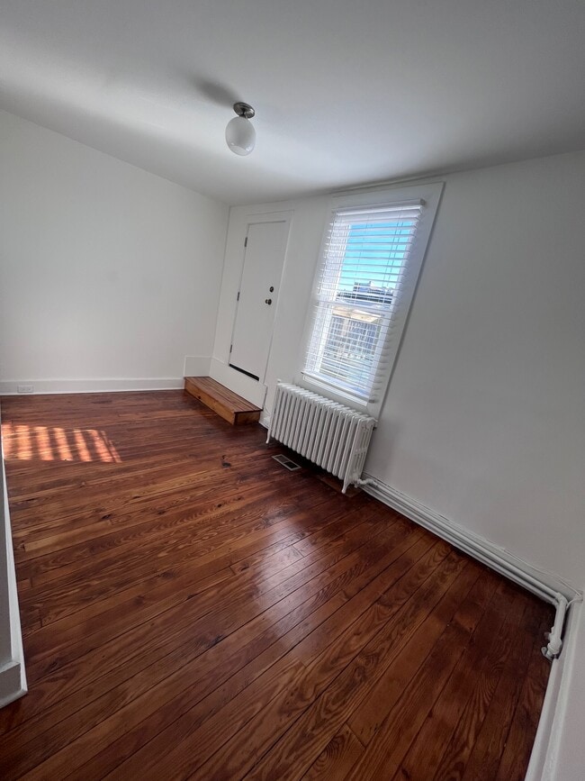 Room leading to back deck - 2135 E Fairmount Ave