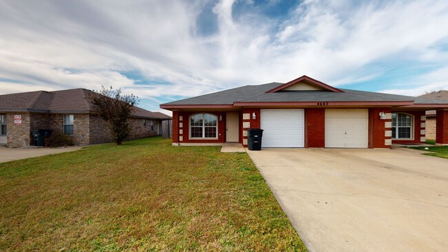 Building Photo - ALL TILE Duplex minutes away from Fort Cav...