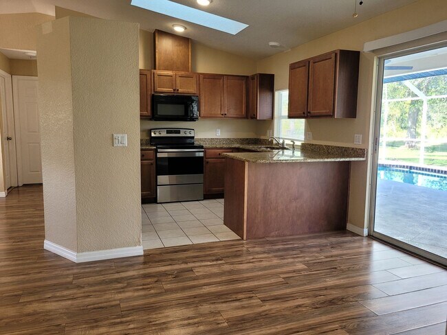 Building Photo - Pool Home, 3 bedroom, 2 bathroom, 2 car ga...