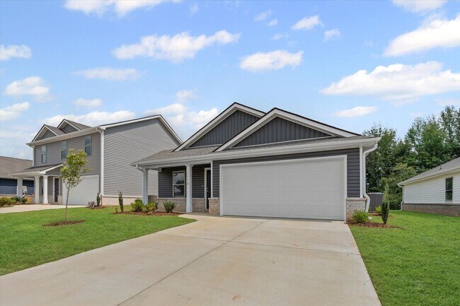 Building Photo - New 4BR Home in Whispering Woods – Spaciou...