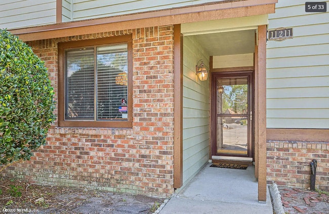 Building Photo - 11211 Windtree Dr