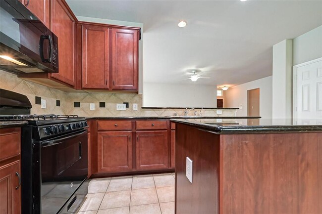 Building Photo - 11310 English Rose Trail