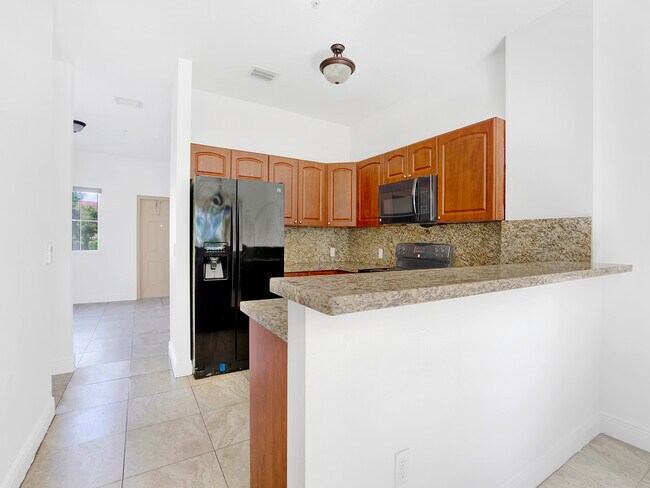 Building Photo - 18140 NW 59th Ave