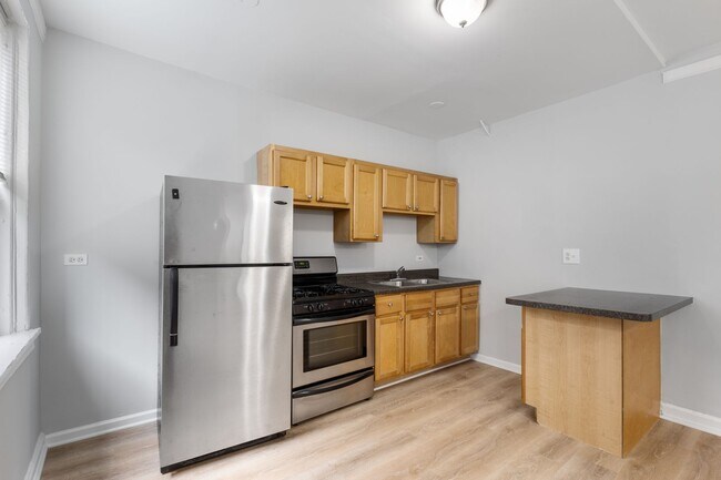 Foto del edificio - 5863 N Kenmore Ave