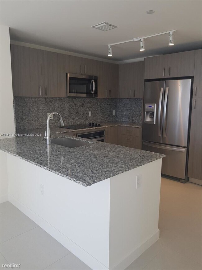 Foto del edificio - 2 br, 2 bath Condo - 5350 NW 84th Ave Unit...