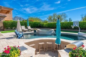 Building Photo - 9705 E Mountain Peak Dr