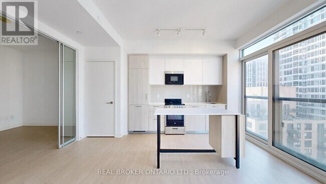 Photo du bâtiment - 65 Mutual St