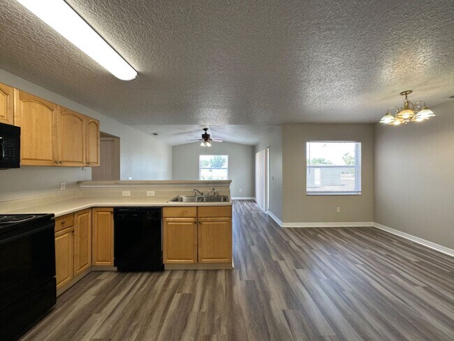 Building Photo - Tons of Space with Brand New Floors and Paint