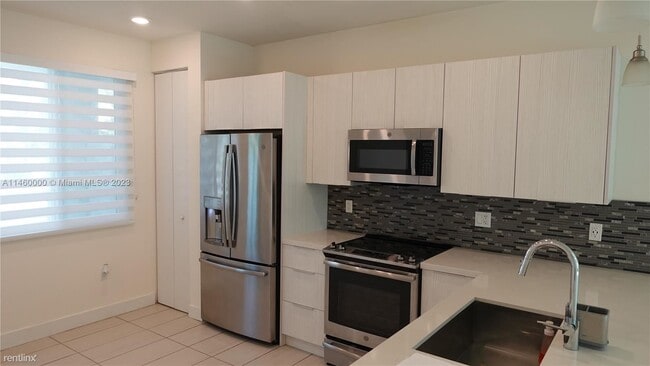 Building Photo - 3 br, 2.5 bath House - 10226 NW 64th Ter A...