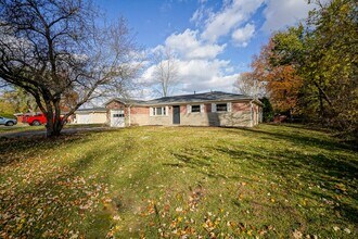 Building Photo - 8509 N Ricks Dr E