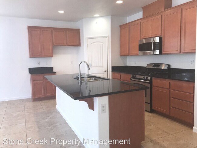 Building Photo - 4 br, 2 bath House - 12345 Canyonlands Dr.