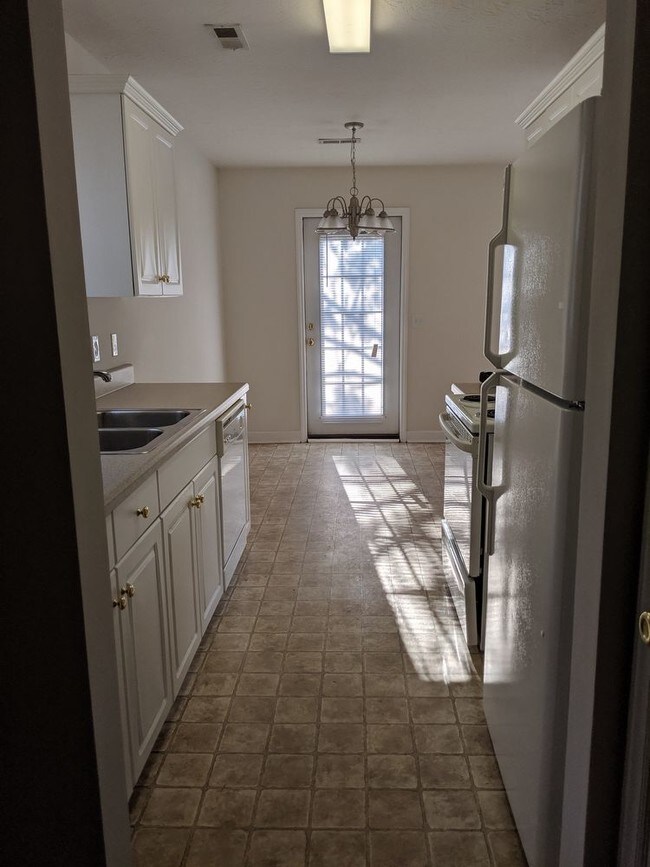 Building Photo - LARSON PLACE TOWN HOMES