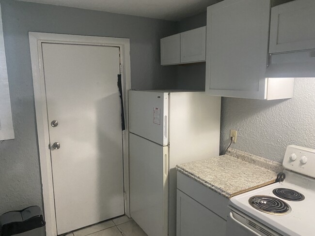 Kitchen with refrigerator and stove and oven - 892 Applewood St