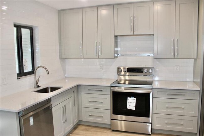 Building Photo - 2155 NE 56th Ct