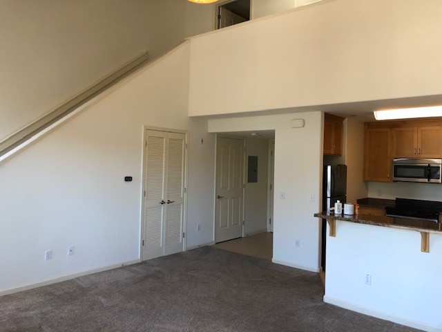 View of Living Room and Kitchen from Balcony - 1804 Mission St