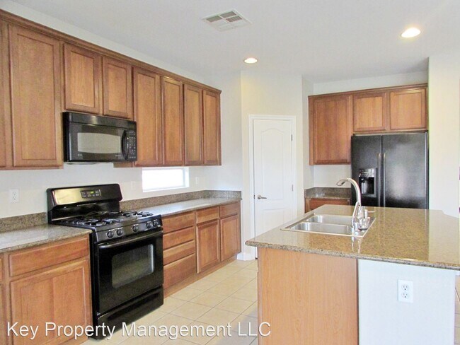 Foto del edificio - 4 br, 2.5 bath House - 1004 Windy Ferrell Ave