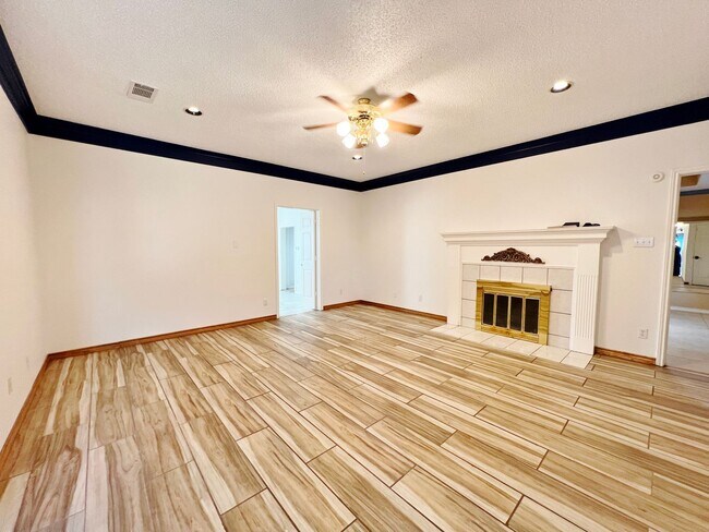 Building Photo - Gated 3-Story 4/4/3 Nestled on Over an Acr...