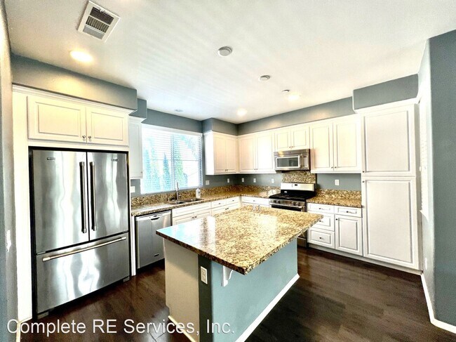 Building Photo - 4 br, 3.5 bath House - 6398 Volans Ct