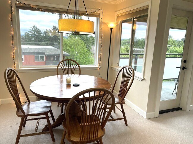 Dining furniture is solid cherry and seats 4. - 5818 NE 70th St