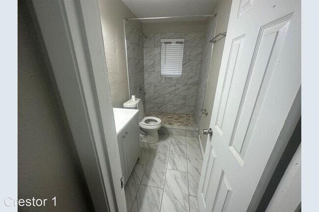 Building Photo - 3 br, 1 bath House - 407 E. Lilly Lane