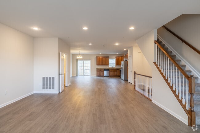 4BR, 2.5BA - 2,600SF - Living Room and Kitchen - Monticello Heights Townhomes