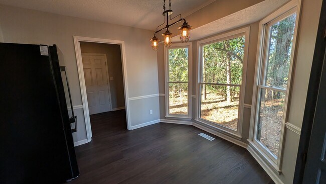 Building Photo - Totally Renovated and Spacious with Huge Basement and Yard