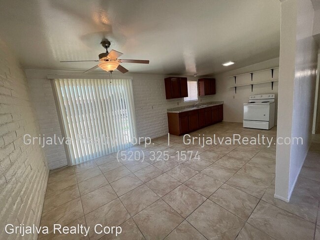 Building Photo - 4 br, 2 bath House - 7110 E. Pomegranate St.