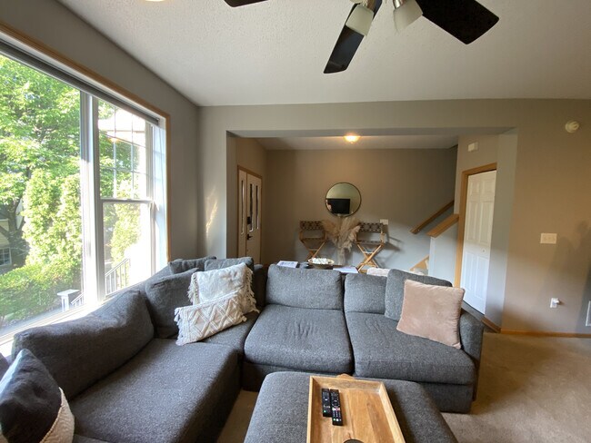 Large entryway with space for console table. Entryway closet great for coats + storage. - 13805 53rd Ave N