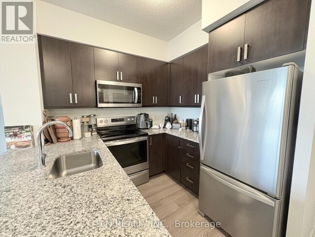 Photo du bâtiment - 1603-1603 Eglinton Ave W