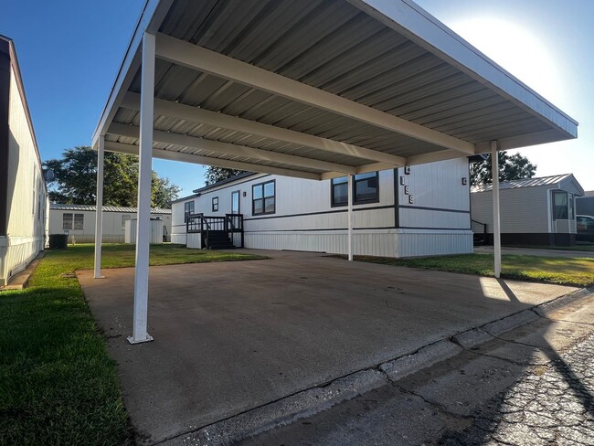 Building Photo - 2/2 Carport in Commanders Palace, In Frens...