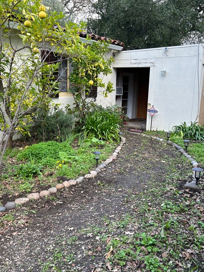 Close-up of walkway to in-law. - 1632 Live Oak Way