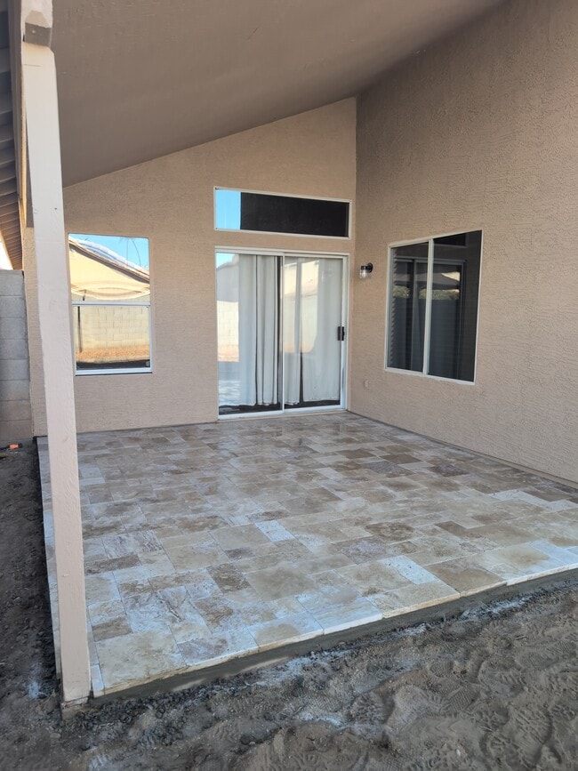 Travertine Patio - 10430 W Orange Dr