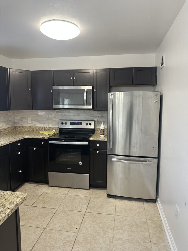 Foto del edificio - 6913 Woodstream Ln