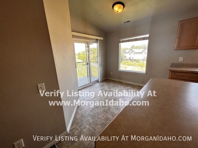 Building Photo - Upstairs with covered parking, large bath,...