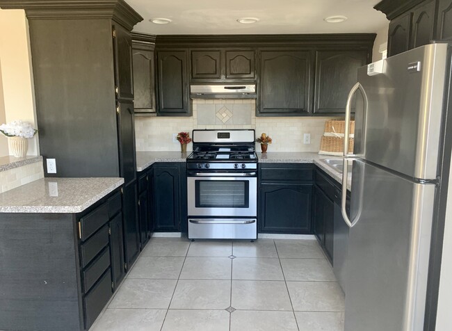 Kitchen SS Gas range - 1520 N Hollywood Way