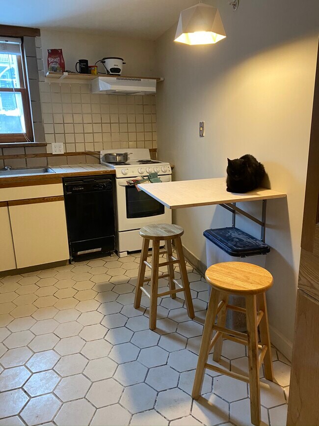 Built in dining table w/stools - 77 Newbury St