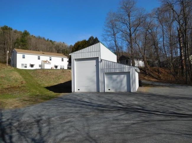 garage\workshop and rear of quadplex - Lefebvre Complex