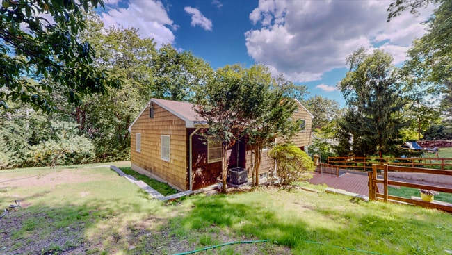 Building Photo - Spacious 3-Bedroom Split-Level with Firepl...