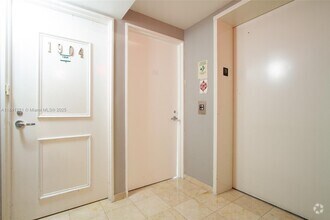 Building Photo - 5900 Collins Ave
