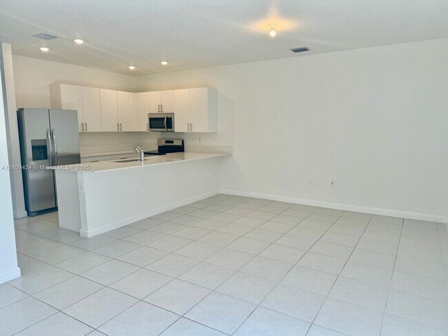 Building Photo - 26459 SW 149th Ave