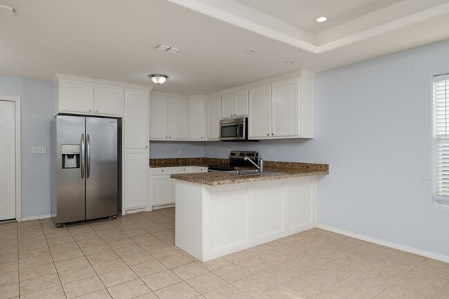 Fridge, microwave, and stove included. - 5615 JJ Ln